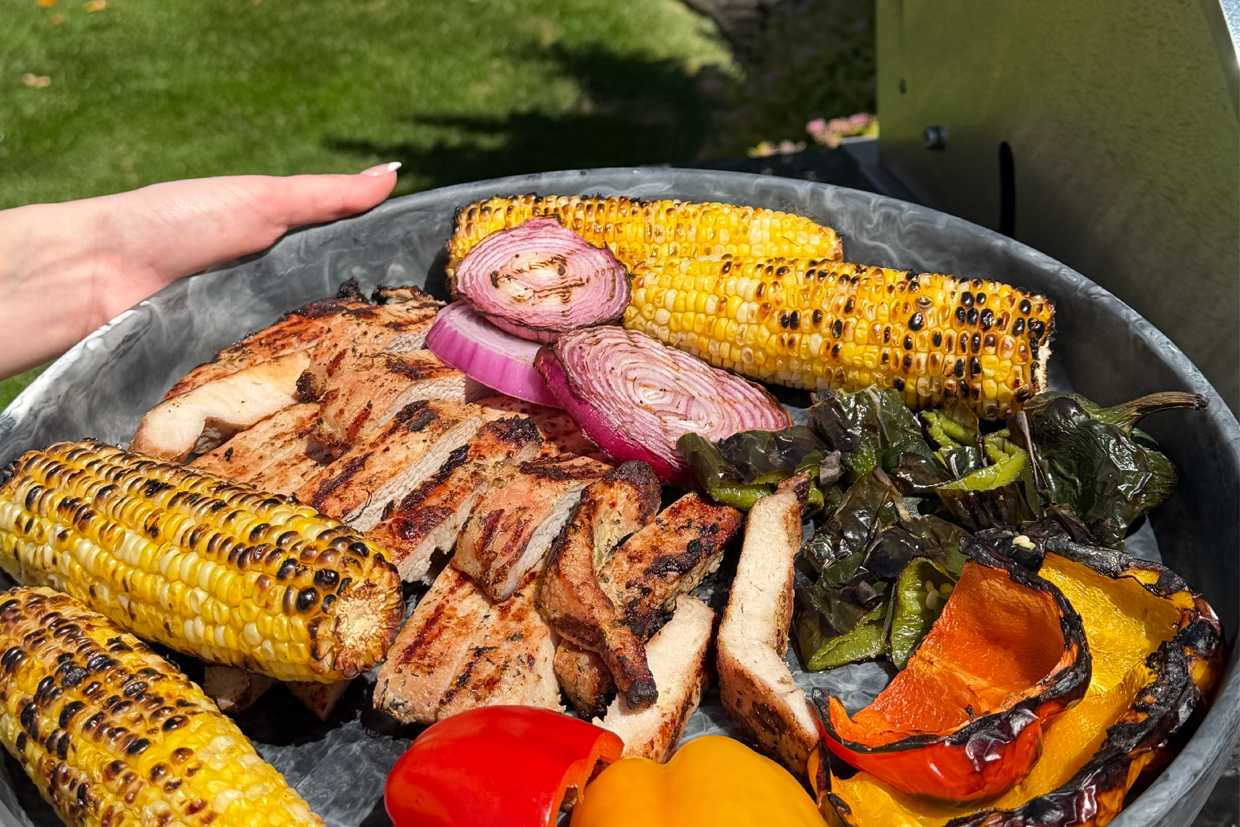 Serving dish of pork tenderloin and vegetables